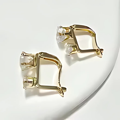 SONNENSTRAHL-OHRRINGE AUS KRISTALL