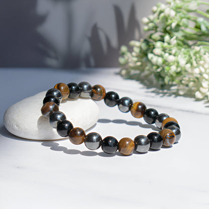 Schutzarmband “Dreifache Kraft“ mit Hämatit, Tigerauge und Obsidian