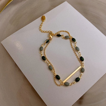 Armband mit zwei Anhängern