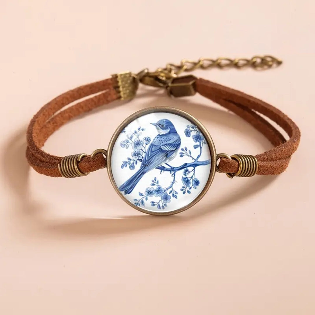 Armband mit blauer Kolibri‑Prägung