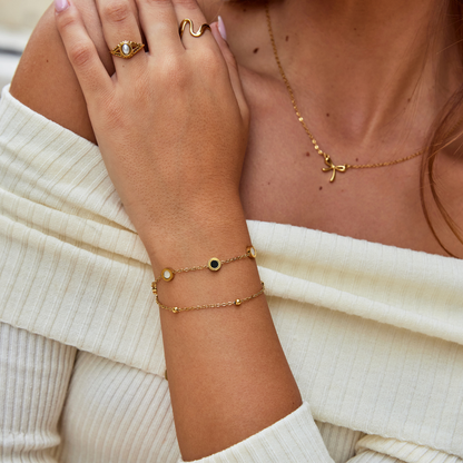 Vintage‑Ohrringe in Gold mit buntem Zirkonia