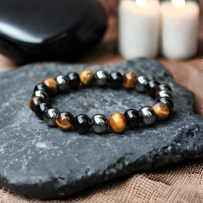 Schutzarmband “Dreifache Kraft“ mit Hämatit, Tigerauge und Obsidian