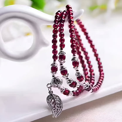 Mehrreihiges Armband “Fülle und Mut“ aus Granat