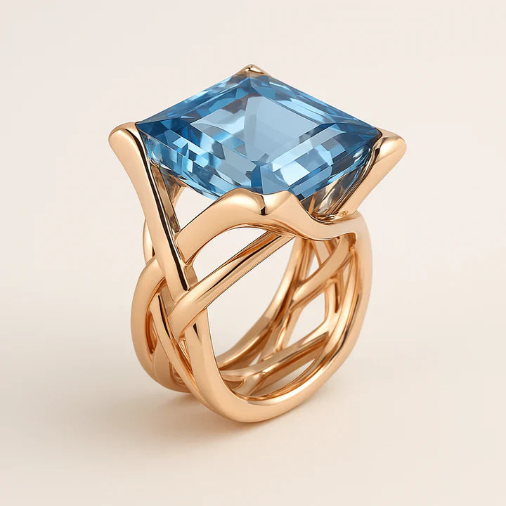 Vintage-Ring aus Roségold mit blauem Zirkonia